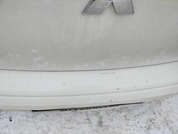 Транспортное средство Mitsubishi Lancer 1.5, 2011 года выпуска, цвет - белый, VIN JMBSNCY2ABU006563, государственный номер K081ET29. Состояние транспортного средства: имеются повреждения, потертости, сколы